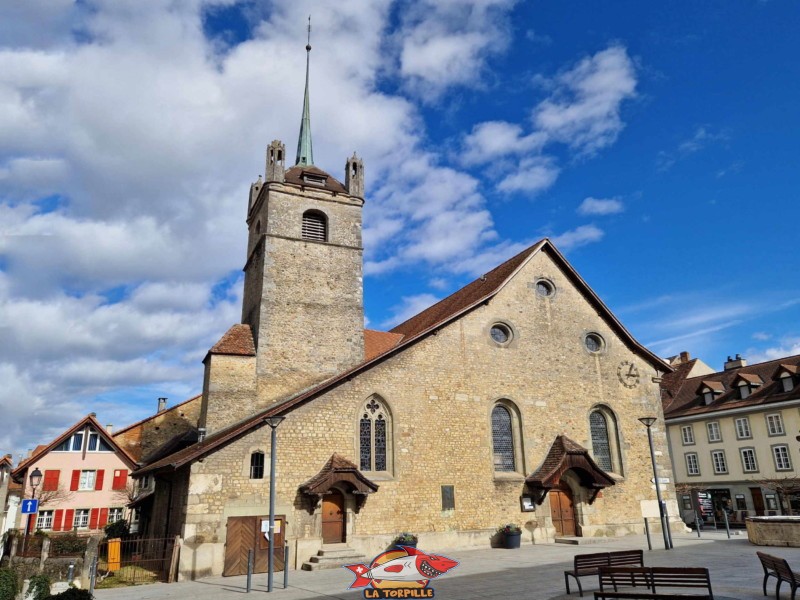 La vue sur la façade d'entrée. Église Réformée Sainte-Marie-Madelaine. Ville médiévale d'Avenches, vieille ville, région de la Broye, canton de Vaud.