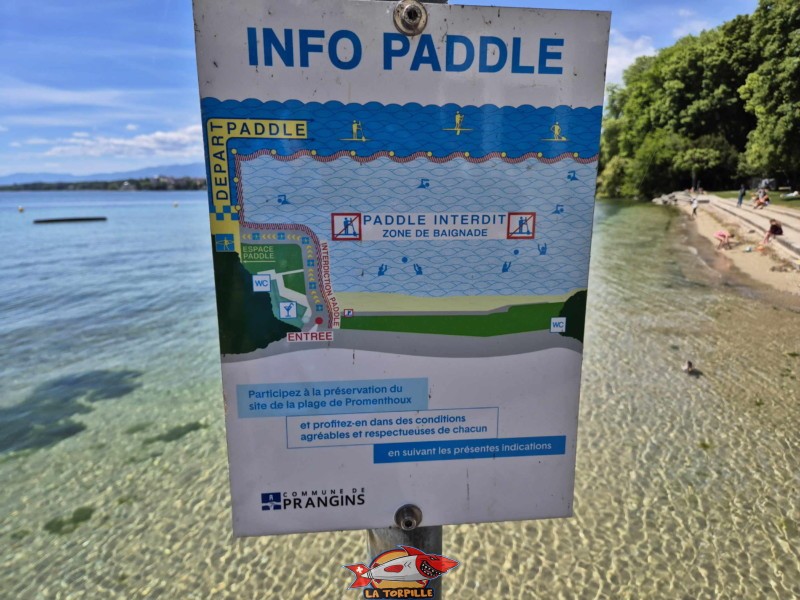 Un panneau qui montre le petit canal réservé aux paddles. Plage de Promenthoux, Prangins, Léman.