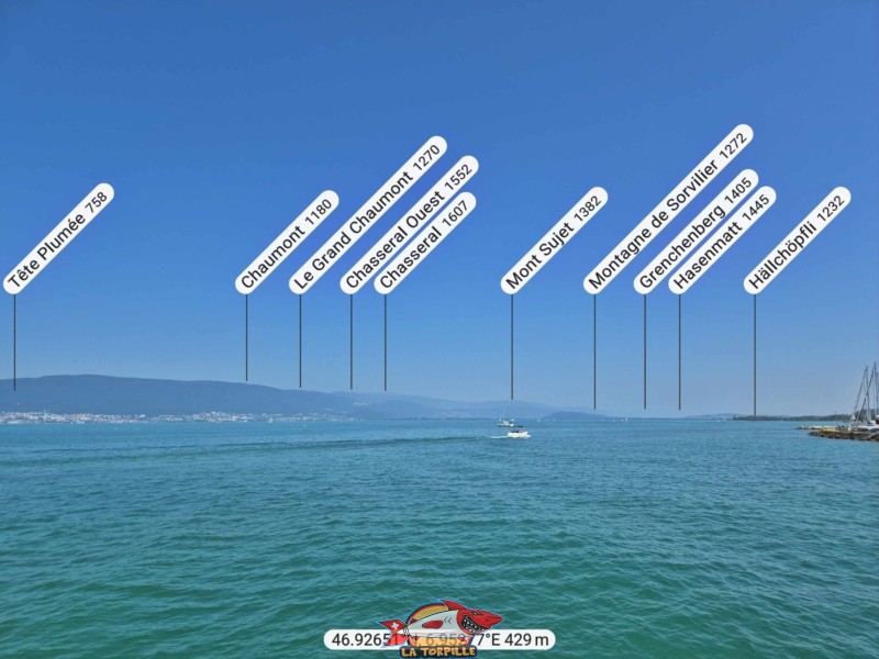 Le panorama direction nord-est depuis le débarcadère de Portalban. Chaumont, Chasseral, Mont Sujet.